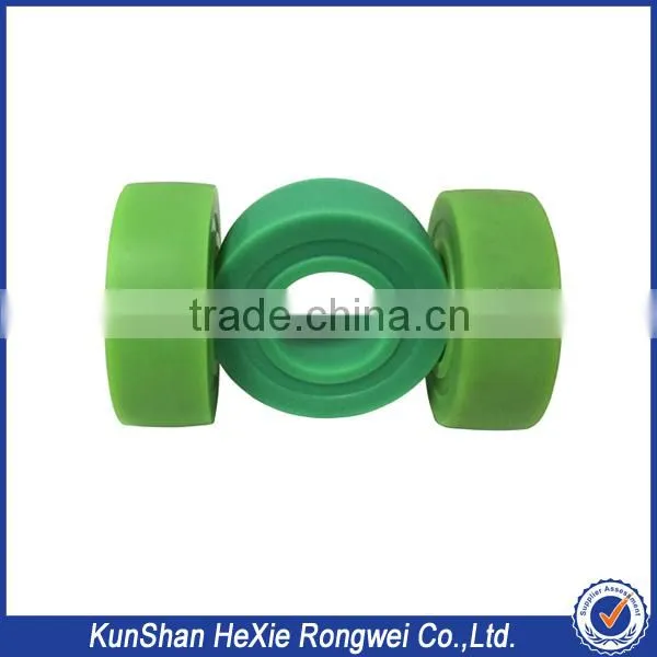 Green and white cnc precision machining parts