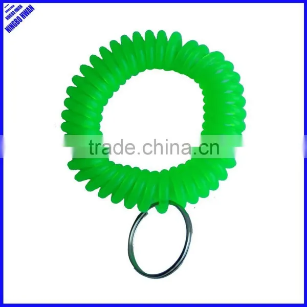 Cheap 5cm diameter soft round plastic wrist coil keychain