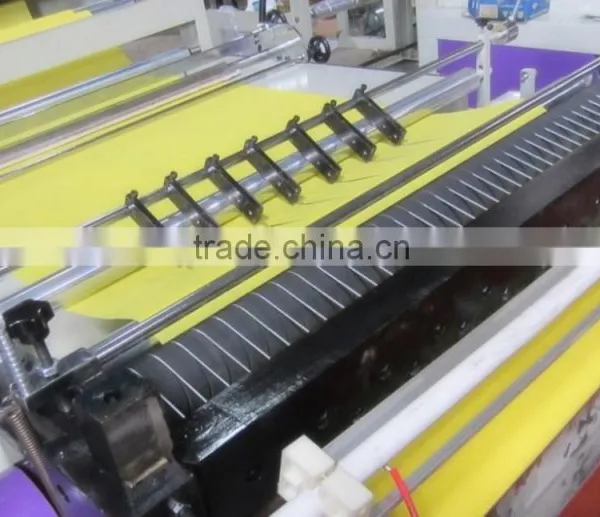 Plastic /Non Woven Fabric/Paper Cross Cutting Machine photo-6