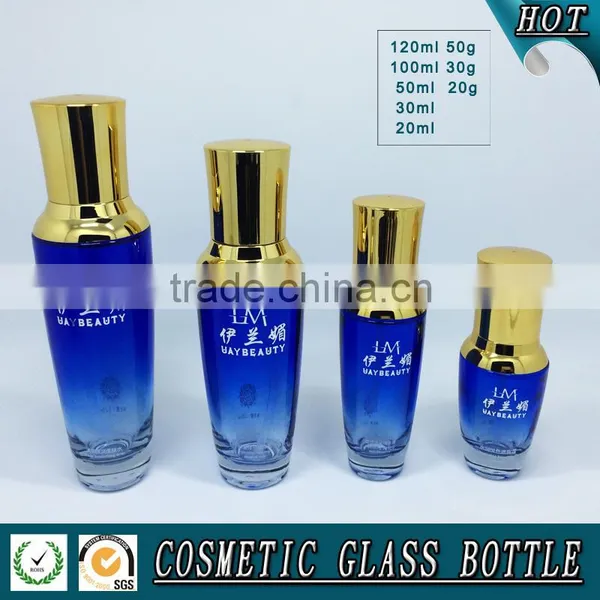 Bule Colored Glass Cosmetic Serum Bottle and Glass Cosmetic Cream Jar With Gold Pump Lid photo-2