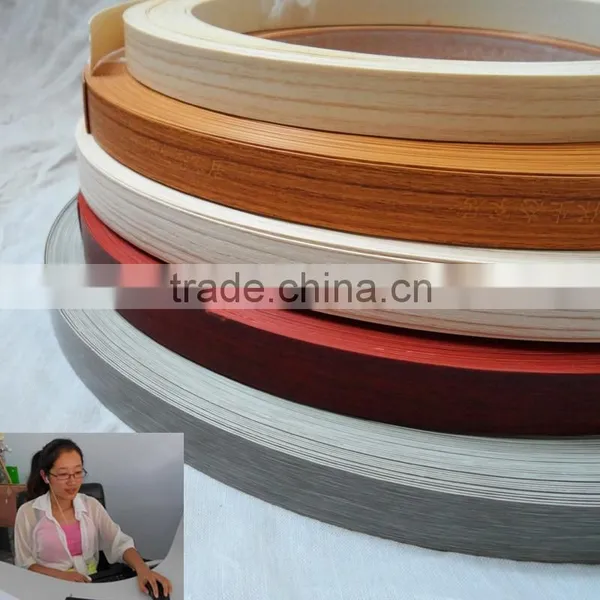 0.6mm Thickness Solid Color and Wood Grain Color PVC Edge Banding photo-6