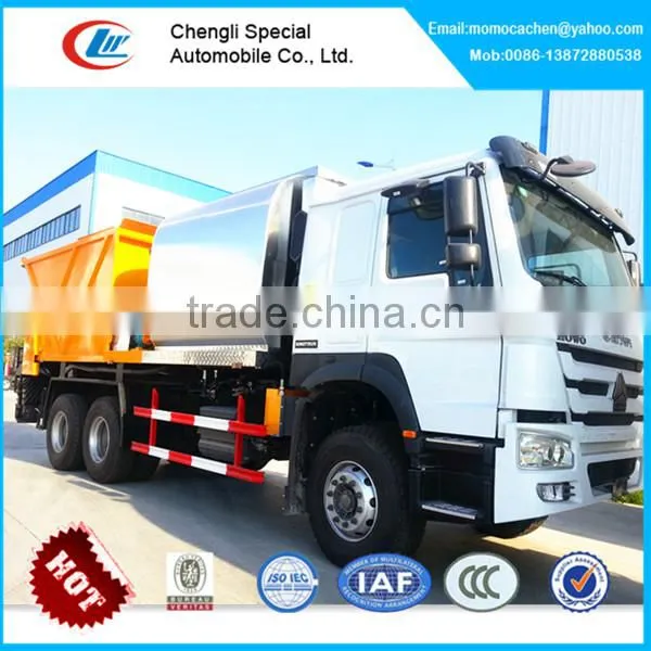 New Howo 6x4 Asphalt Synchronous Chip Sealer,asphalt Gravel Chip Sealer With Camera