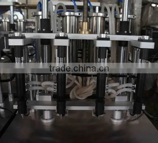 China Guangzhou Factory Small Perfume Bottle Four Head Filling Machine/equipment With Negative Pressure for Sale photo-4