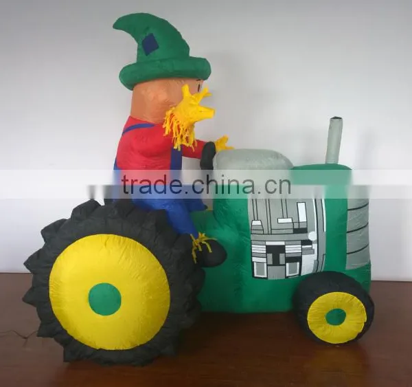 Animated Inflatable Farmer/Peasant Toy on Green Tractor With Yellow Wheels photo-3