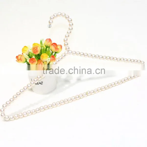 New Design Cheap Brass Pearl Clothes Hanger photo-3