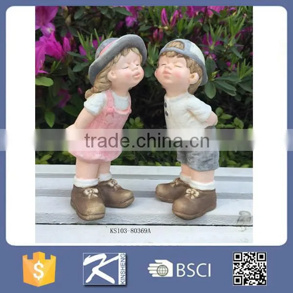 Garden boy and girl terracotta statue