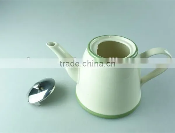 Cream Ceramic Teapot With Iron Cover With Cheap Price in Stock photo-2