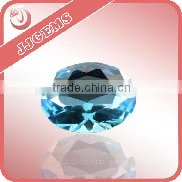 wuzhou fashion rough machine cut oval shape blue spinel stone