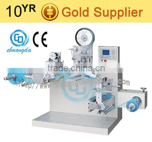 J:CD-100 Automatric Labeling and Rewinding Machine