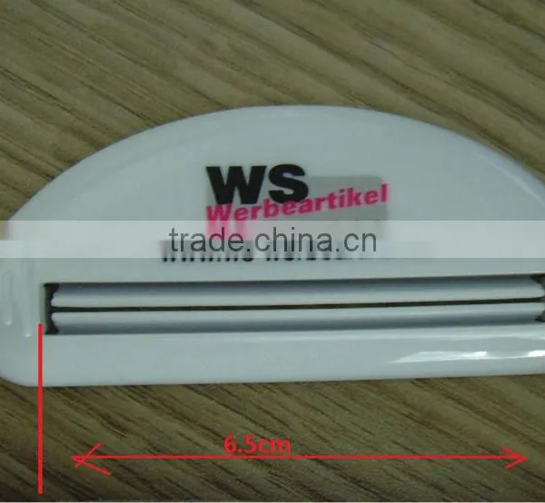 toothpaste holder squeezer