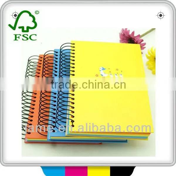 colorful printing notebook with sticky note