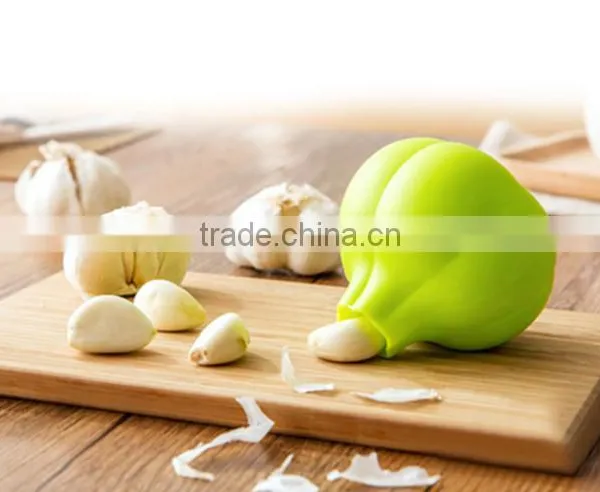 China Factory Hotsale Convenient Kitchen Vegetable Tools Silicon Garlic Peeler photo-4
