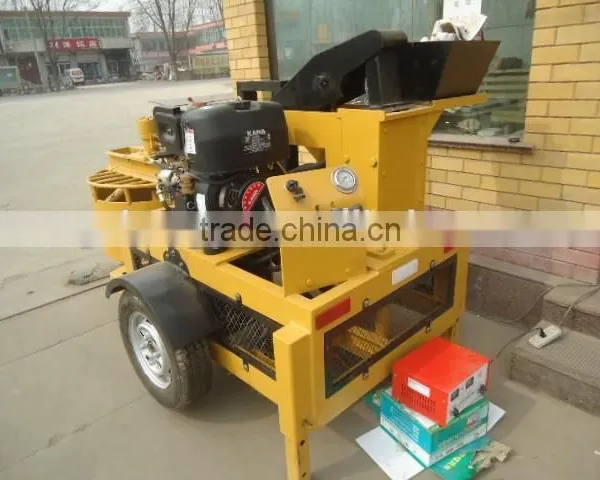 New Design SY1-20 Hydraulic Cement Clay Interlocking Brick Machine With Free Mixer Behind Price for Sale photo-4