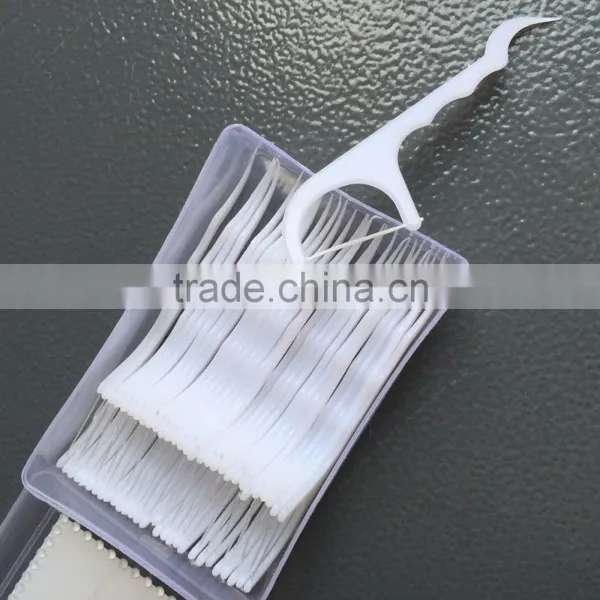 Inter-floss brush dental floss pick in box