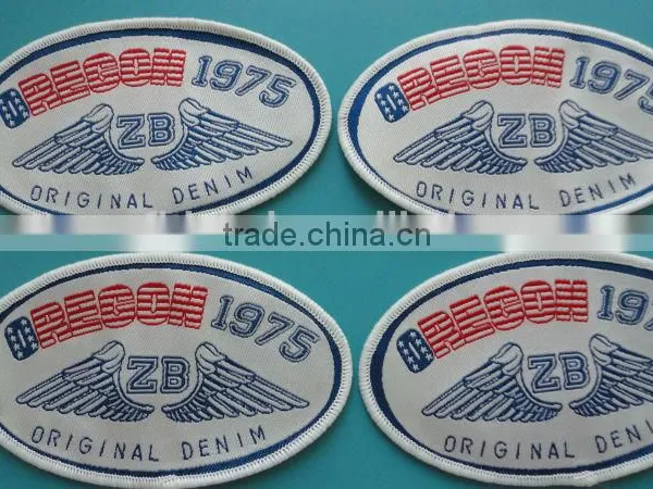 China Excellent Clothing Badge Woven Fabric Patch photo-5