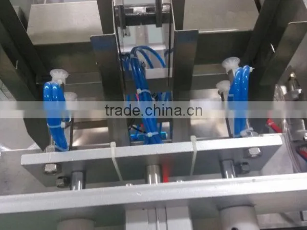 China Guangzhou GMP Standard Double Head Face Mask Making Machine photo-5