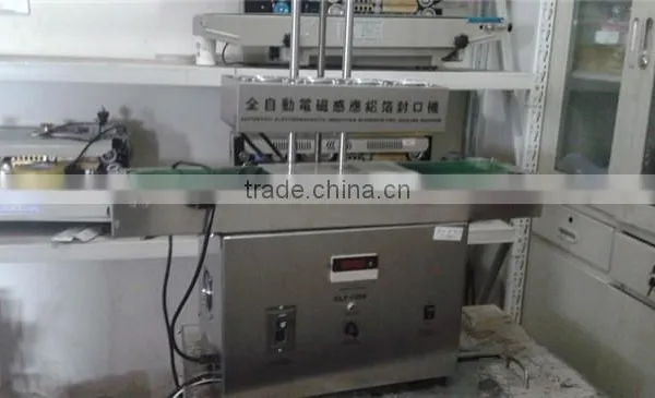 Automatic Aluminum Foil Cap Sealing Machine With Best Price photo-6
