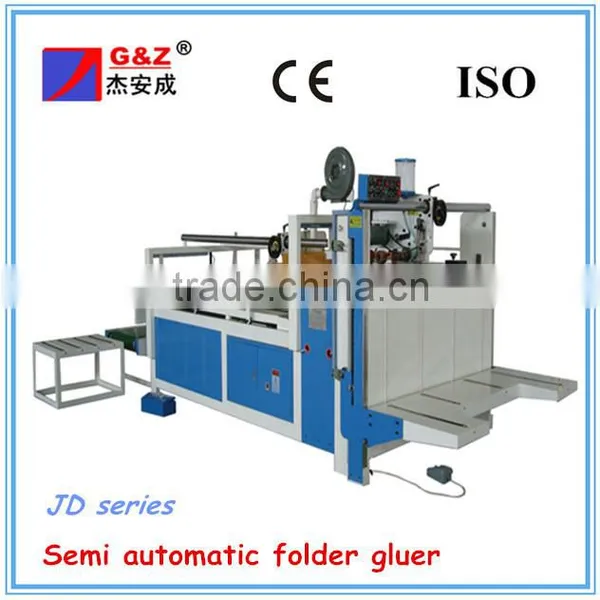 Box gluer and folder machine