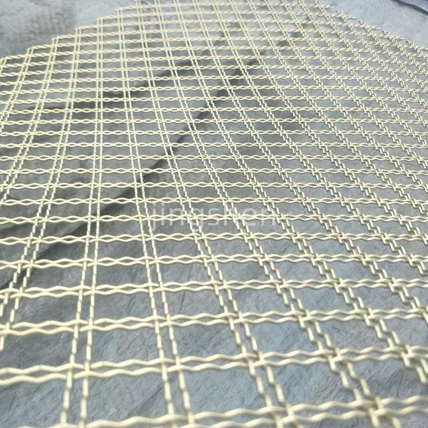 Decorative Woven Brass and Stainless Steel Crimped Wire Mesh, Offering Bending, Cutting, and Welding Services.