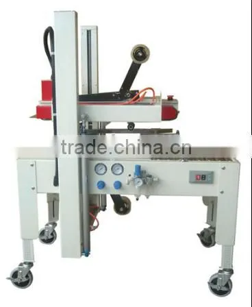 Pneumatic carton sealing machine