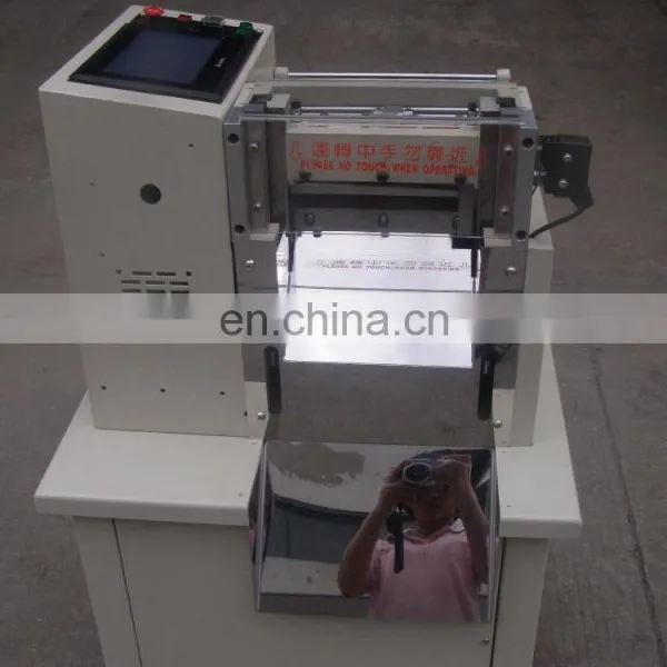 Automatic Woven Label Fabric Label Wash Care Label Cutting Machine photo-4